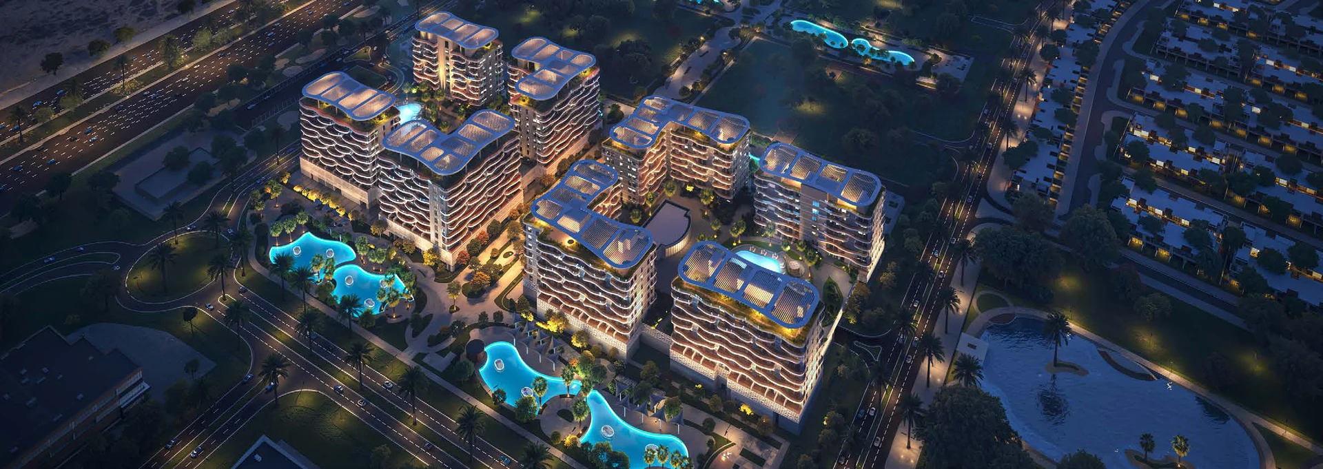 DAMAC Lagoon Views contemporary wave-architecture building at dusk